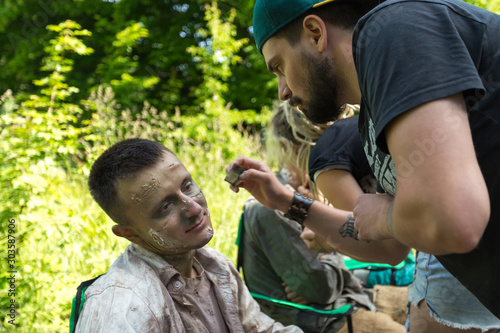 Makeup for zombies, preparing for shooting dead people © vadimborkin