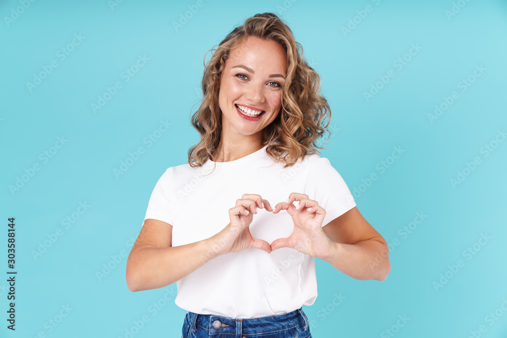 Attractive lovely young girl wearing casual clothing standing Attractive lovely young girl wearing casual clothing standing