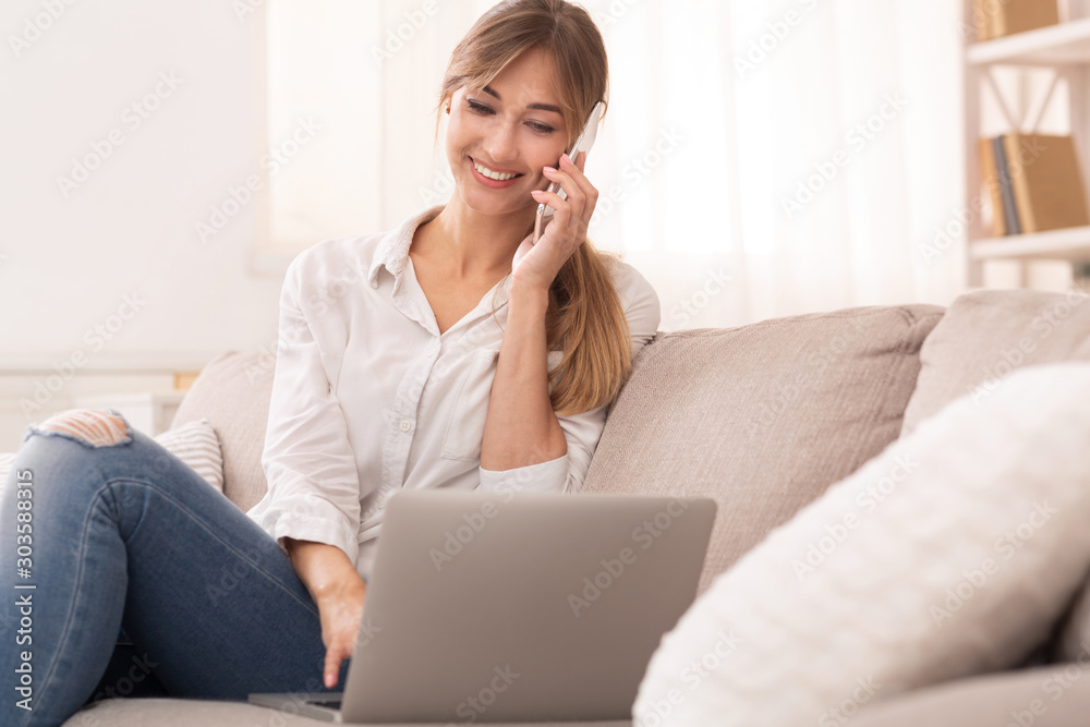 Happy Woman Talking On Phone Sitting On Sofa At Home Happy Woman Talking On Phone Sitting On Sofa At Home