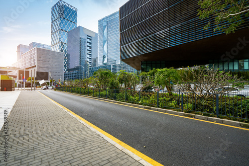 The expressway and the modern city skyline are in Chongqing, China.