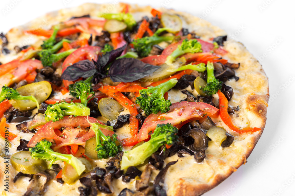 vegetarian pizza with vegetables on a white background vegetarian pizza with vegetables on a white background