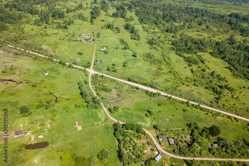 Aerial views of villages, forests and roads