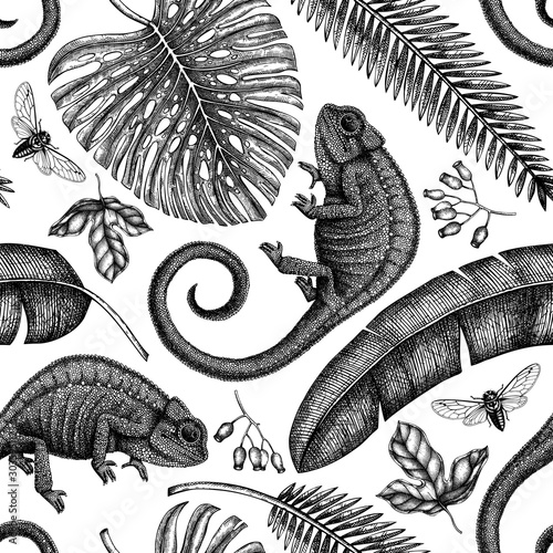 Tropical plants and animals seamless pattern. Vector background with hand drawn chameleon, monstera, banana palm, date palm leaves and ylang flowres. Exotic plant botanical backdrop.  photo