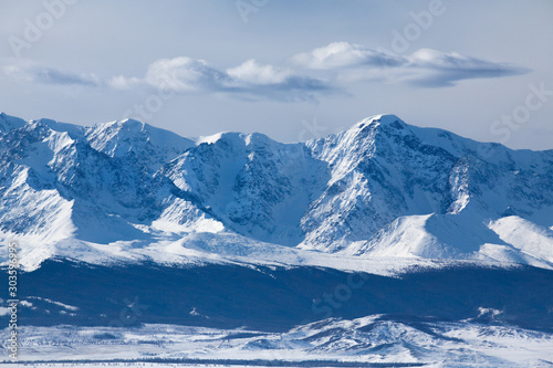 Landscape. View of the snowy slopes of the Altai mountains. October.