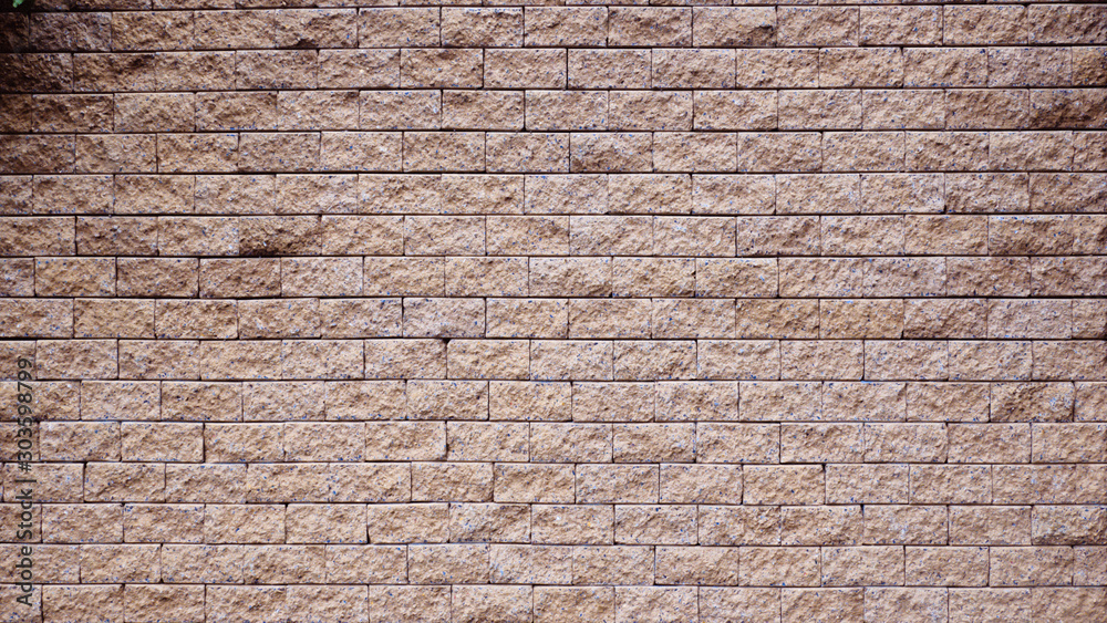 Brown rock stone Seamless texture, background, stone lined walls