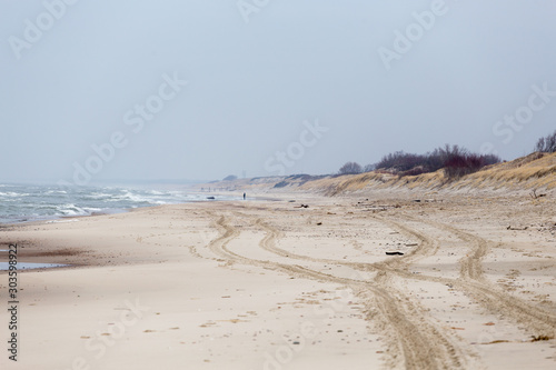 coast of the Baltic Sea in spring, the beach of the Curonian Spit