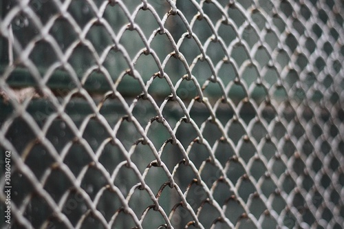 White iron lattice on the window macro view