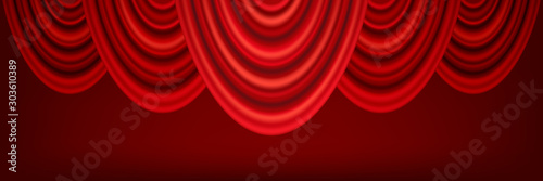 Red curtains of theater stage.