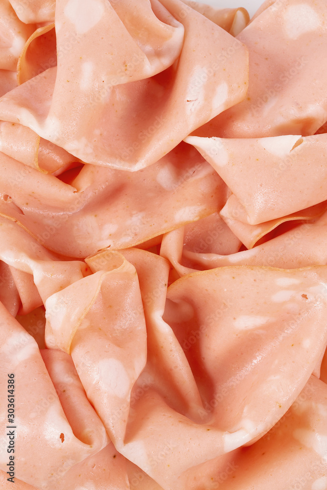 Wall Mural thin slices of mortadella ham isolated on white
