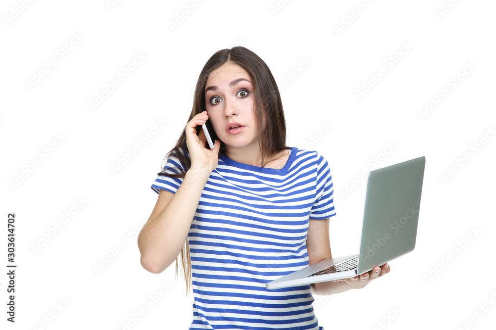 Young girl with laptop computer and smartphone isolated on white background Young girl with laptop computer and smartphone isolated on white background