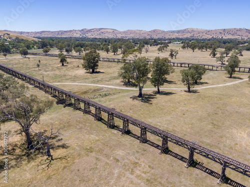 Aerial drone view of the historic Gundagai Railway Viaduct  part of the disused Tumut Railway line near Murrumbidgee River in Gundagai  New South Wales  Australia. The site is a popular for tourists.