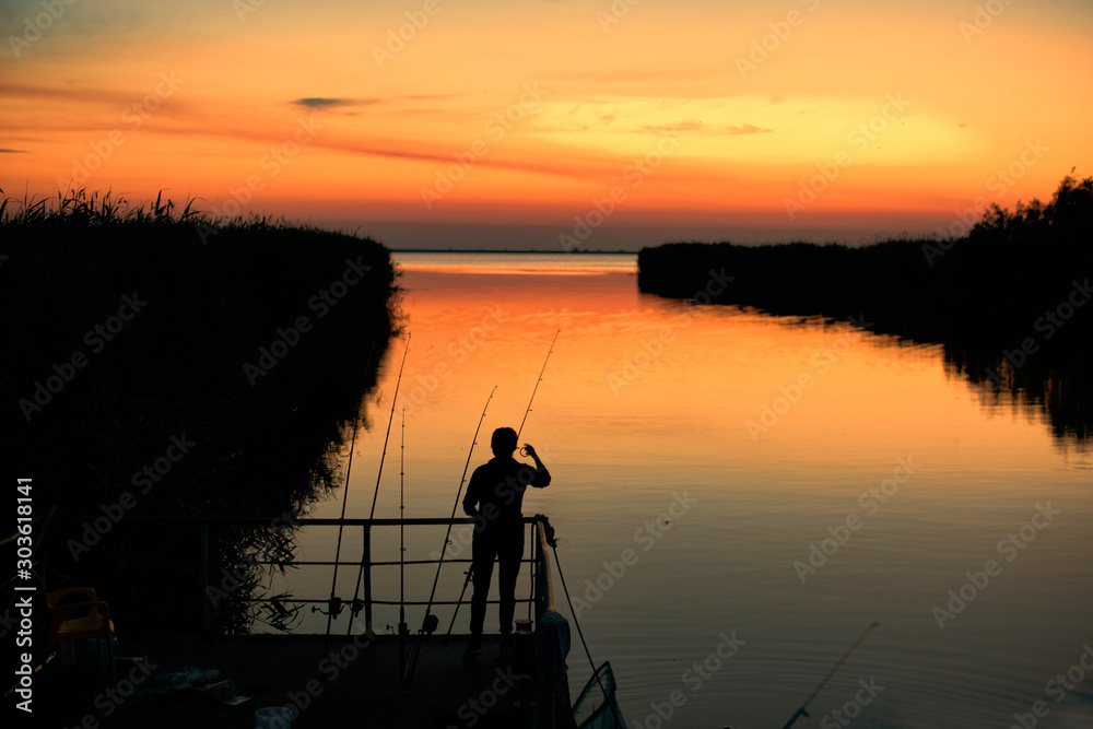 Fishing in the Danube Delta at sunset
