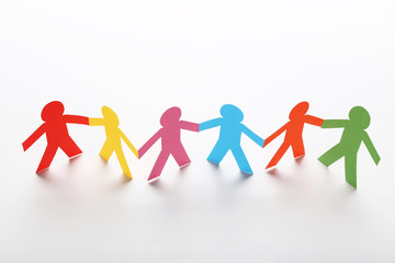 Colorful paper chain people on white background
