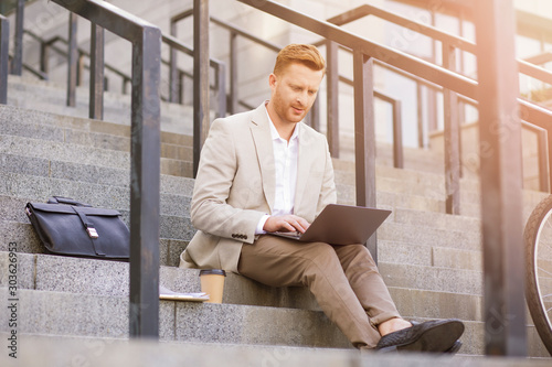 Busy manager having video conversation stock photo