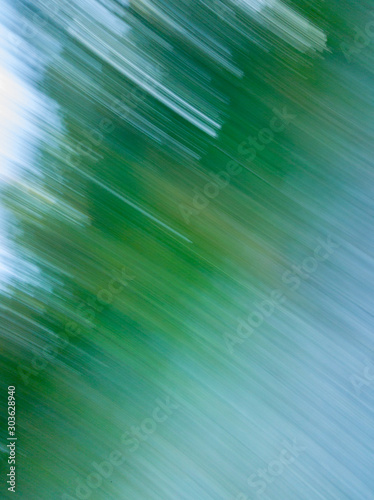 Abstract green white blur light streaks painting background © Eric Buell