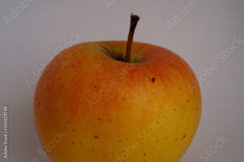 yellow apple on white background