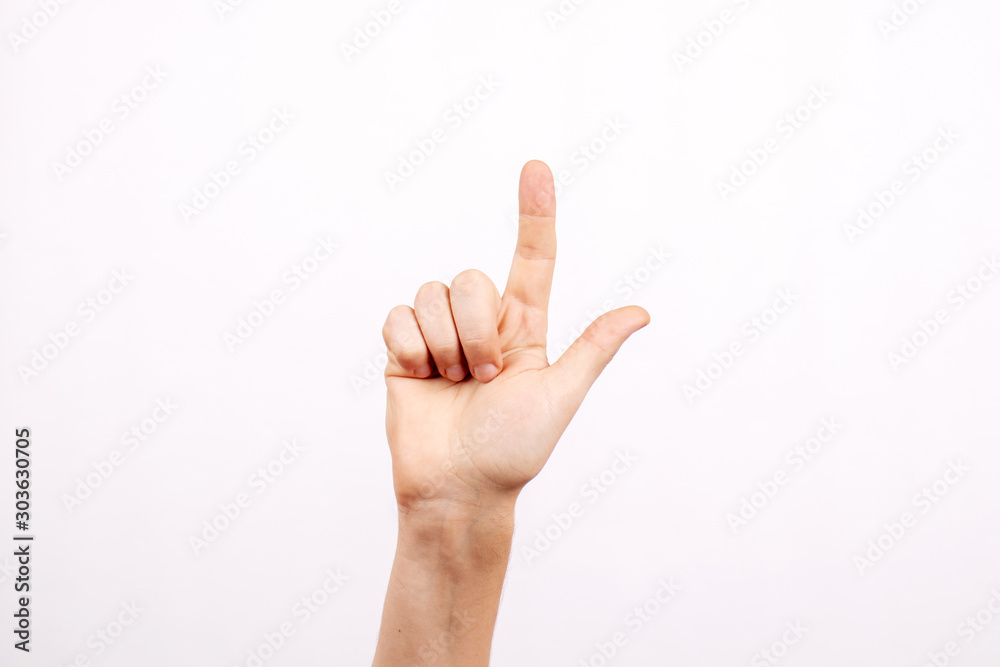 The man's hand isolated on white background. Gesture pointing, thumbs up, selection, pressing, indicating. The man's hand isolated on white background. Gesture pointing, thumbs up, selection, pressing, indicating.