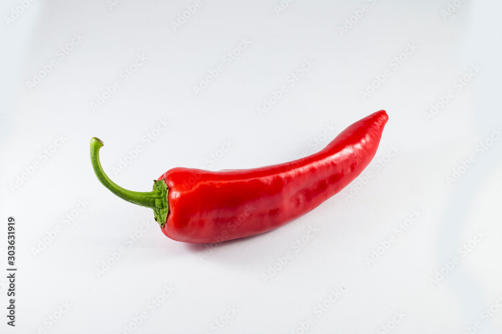 Fresh red pepper, white background