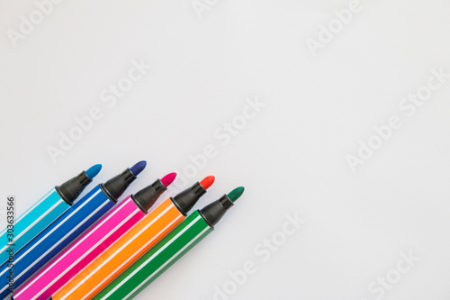 Colored felt pens, white background