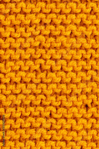 Orange macro yarn close up knitted texture