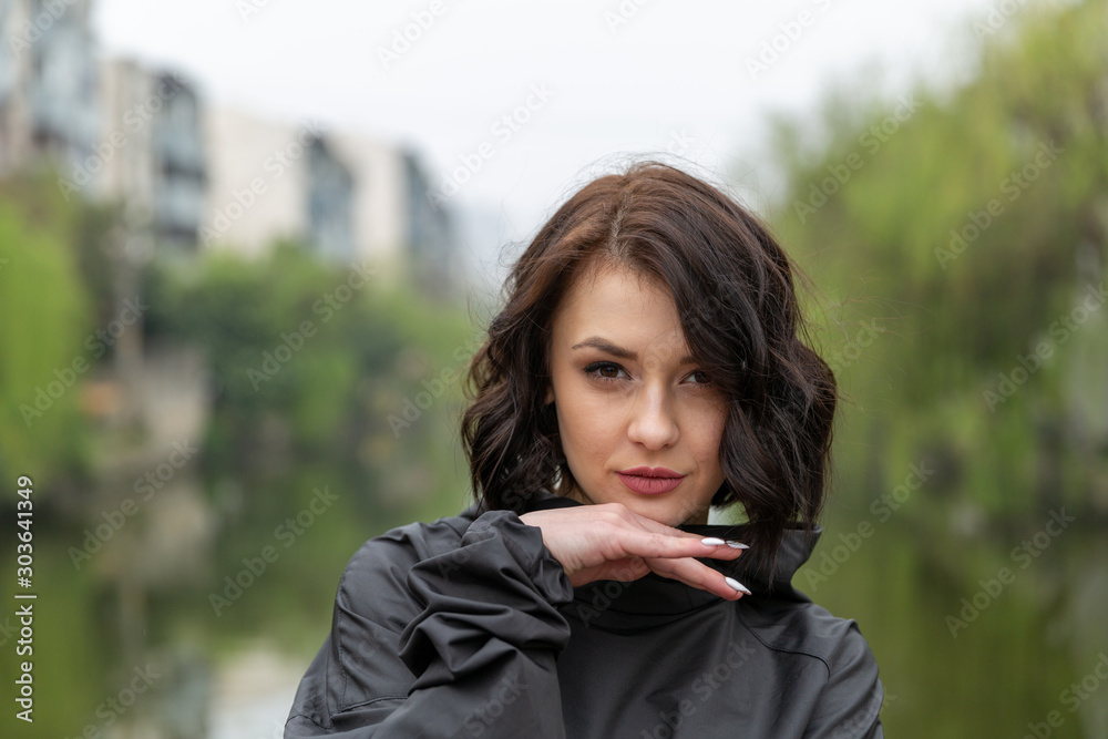 portrait of young woman in autumn park portrait of young woman in autumn park