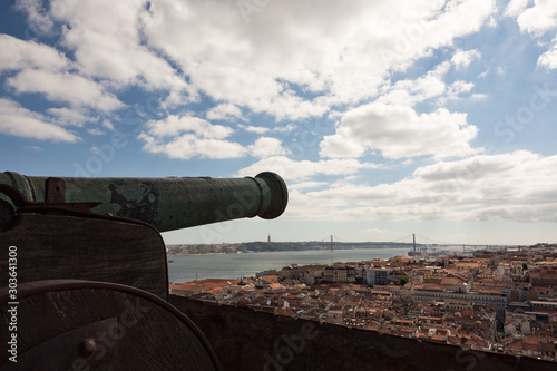 An old cannon looks out over Lisbon photo