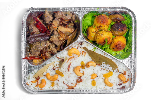 The Food Warmer Aluminum Foil Rectangular Disposable Parcel lunch box. Thai and Chinese style meal take away delivery. 450ML 3 parts Foil Container lunch food box. Top view, at white background.