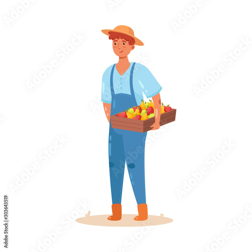 Male farmer holding a wooden box with a crop of fruits. Vector illustration in flat cartoon style. © greenpicstudio