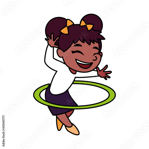 girl smiling and playing with hula hoop