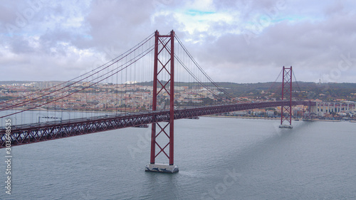 Famous 25th April Bridge over Tagus River n Lisbon - travel photography