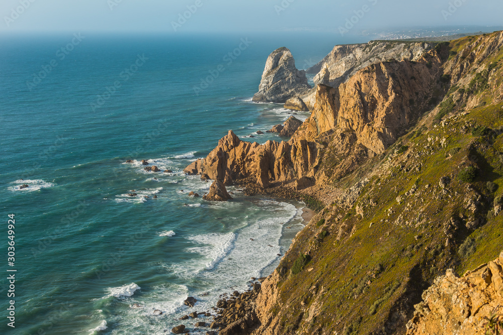 Cliff in the coastline with blue sea