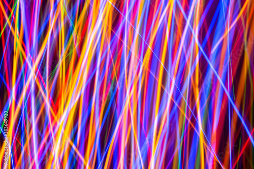 Colorful lights on the long exposure with motion background, Abstract glowing colorful lines, slow speed shutter.
