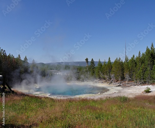 Wide shot of the Emerald Spring at the Norris Geyser Basin at Yellowstone National Park, Wyoming.