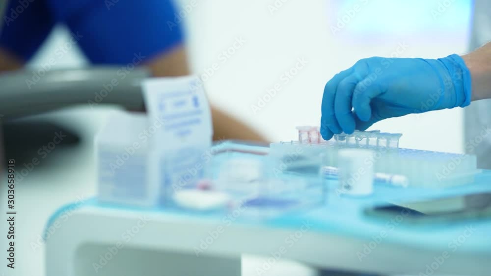 Sport science medical research blood testing probes glasses. scientist and athlete during the professional test in lab. professional sport analyzing 