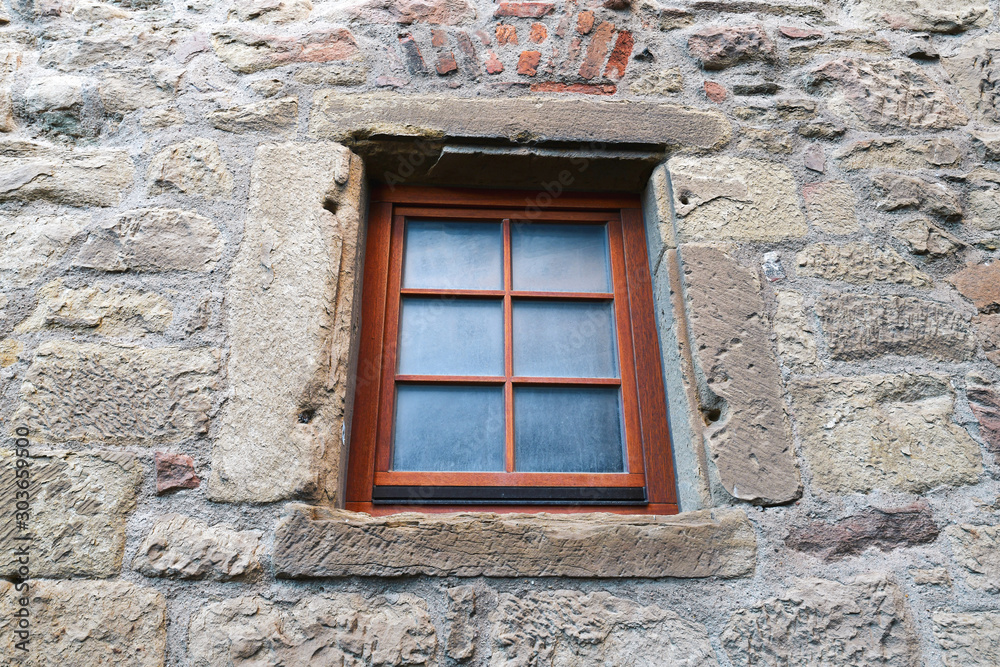 Wooden window at wall of medieval fortress called 'Burg Steinsberg' in city Sinsheim Wooden window at wall of medieval fortress called 'Burg Steinsberg' in city Sinsheim