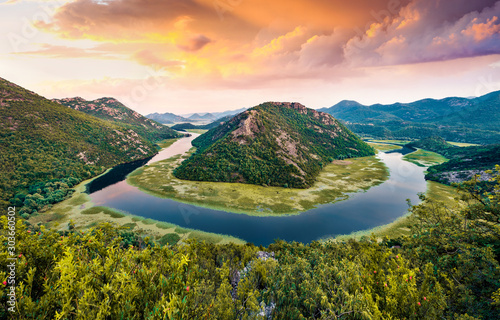 Incredible evening view of Canyon of Rijeka Crnojevica river, Skadar lake location. Fantastic summer sunset of Montenegro countryside. Beautiful world of Mediterranean countries.