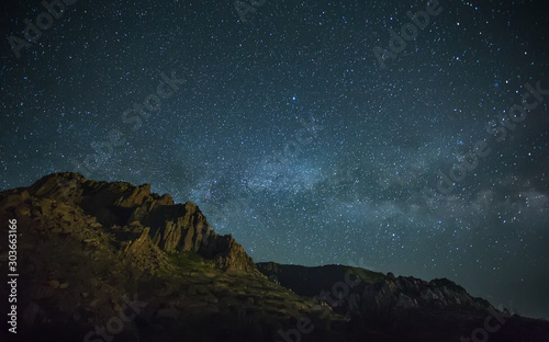 night photo of the mountains, Milky Way over the sea, the starry sky
