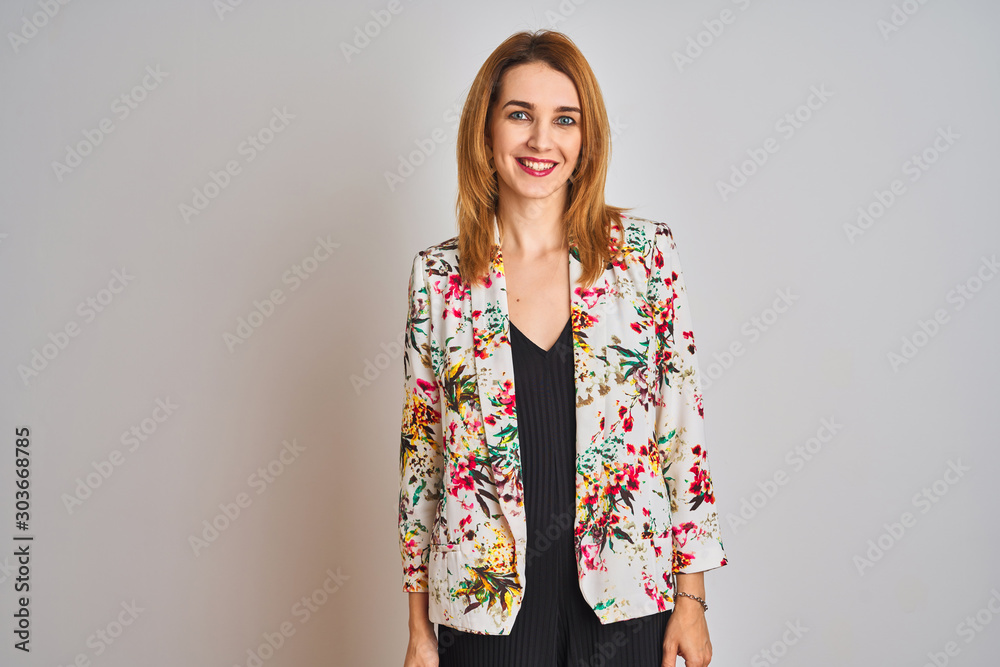 Φωτογραφία Young caucasian business woman wearing spring floral jacket suit over isolated background with a happy and cool smile on face