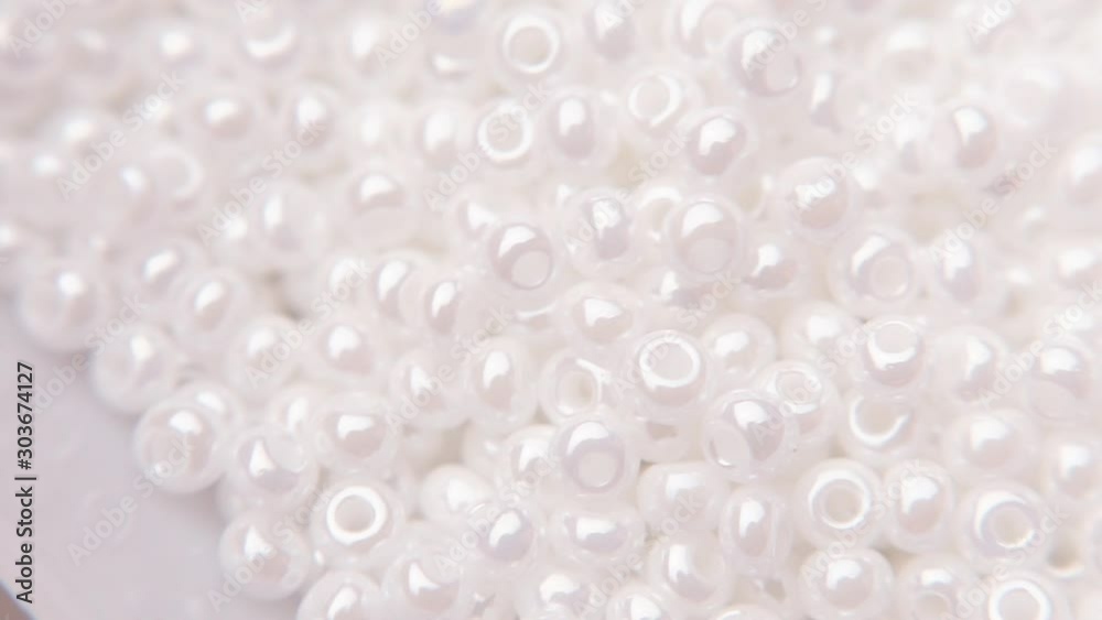 White jewelry beads with one hole. White jewelry beads with one hole.