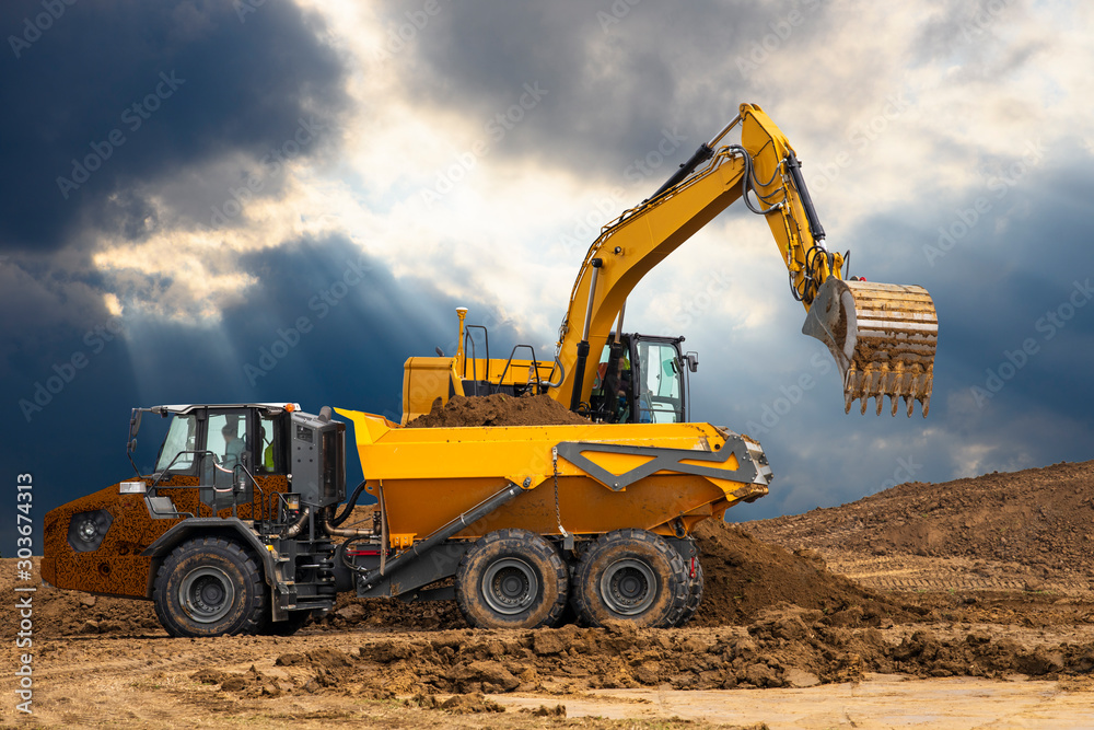 Excavator on a construction site Excavator on a construction site