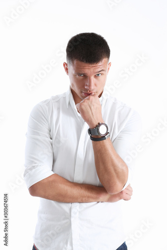 Young successful businessman on a white