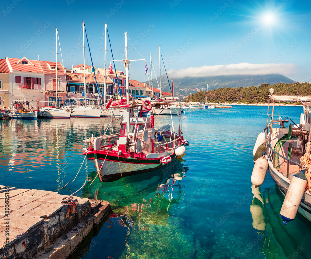 Sunny morning seascape of Ionian Sea. Great outdoor scene of Kefalonia island, Greece, Europe. Nice summer view of Fiskardo port. Traveling concept background.