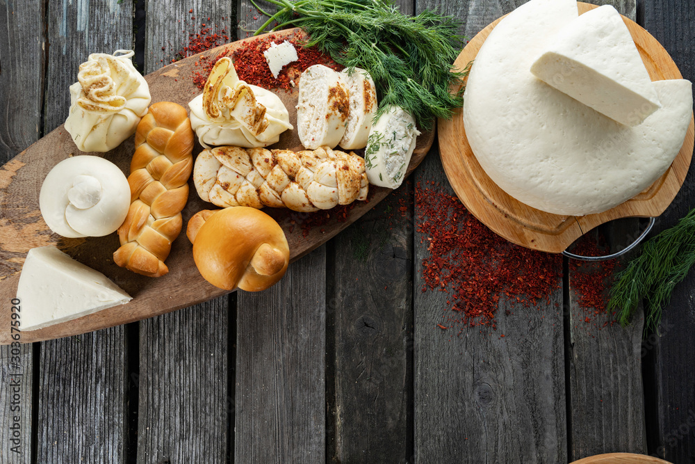 Cheese plate over wood background Cheese plate over wood background