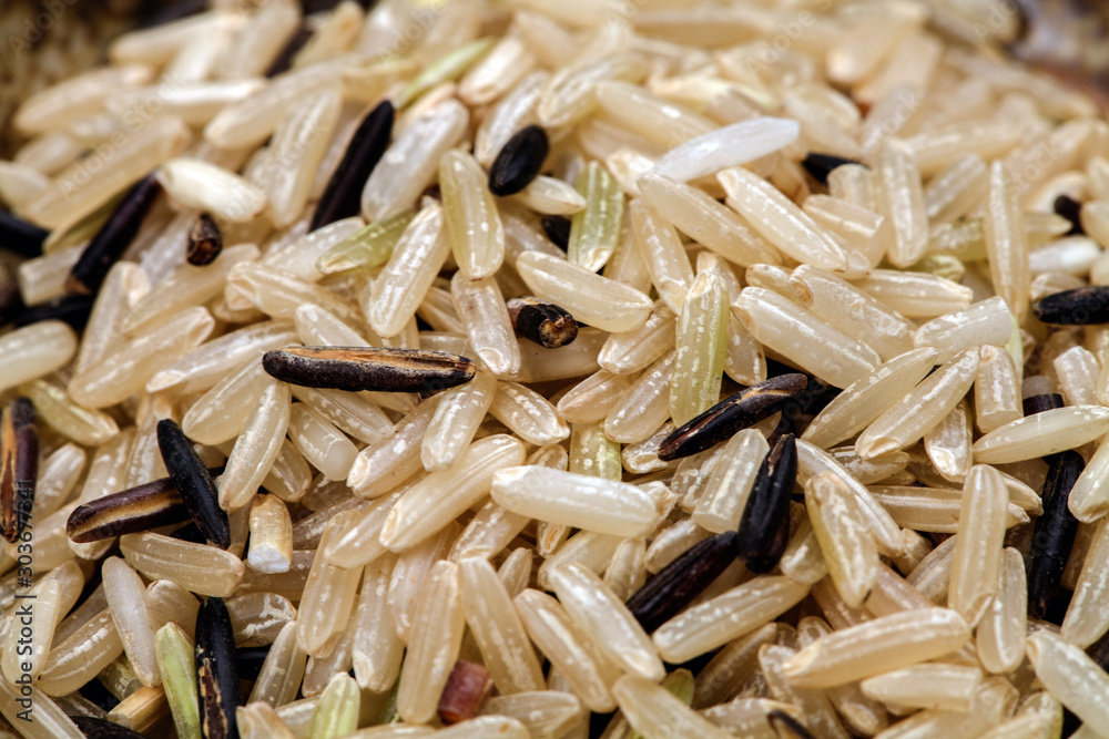 handful of brown rice close-up top view