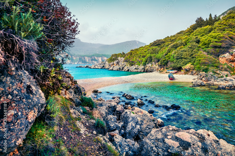 Splendid summer view of Limni Beach Glyko. Fabulous morning seascape of Ionian Sea. Picturesque outdoor scene of Corfu island, Greece, Europe. Beauty of nature concept background. Splendid summer view of Limni Beach Glyko. Fabulous morning seascape of Ionian Sea. Picturesque outdoor scene of Corfu island, Greece, Europe. Beauty of nature concept background.