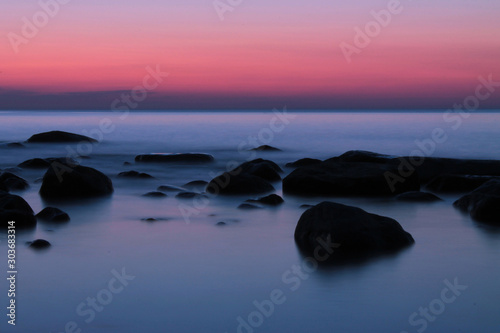 stones on the beach dusk, long exposure