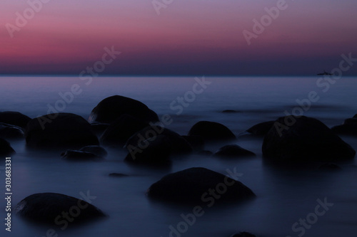 stones on the beach dusk, long exposure