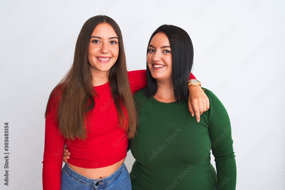 Young beautiful women wearing casual clothes standing over isolated white background with a happy and cool smile on face. Lucky person. Young beautiful women wearing casual clothes standing over isolated white background with a happy and cool smile on face. Lucky person.