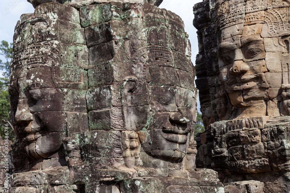 Faces of Bayon Temple, Siem Reap, Cambodia. This temple is famous for its variety of different Buddah faces. They are in pristine condition and rank among the most popular temples.