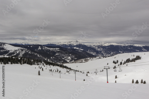Panorama of ski slope at Vail, Colorado, united states on a cloudy dull day. Huge skiing resort in america